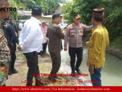 Kapolres Simalungun Diwakili Kapolsek Tanah Jawa Dampingi Bupati Cek Aliran Irigasi Persawahan