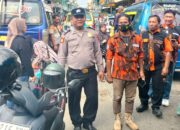 Kapos Aiptu Edi Syahputra Ciptakan Keamanan bagi Pengunjung dan Pedagang Pasar Horas.