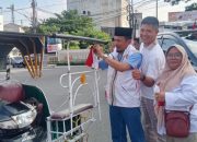 DPC Partai Gerindra Labuhanbatu Bagikan Ribuan Bendera Merah kepada Warga