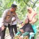 Kapolres Simalungun AKBP Marganda Aritonang Salurkan Bantuan untuk Warga Terdampak Angin Puting Beliung di Talun Rejo